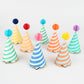 Bright striped party hats with honeycomb balls, gold foil details, and elastic cord, pack of 8."