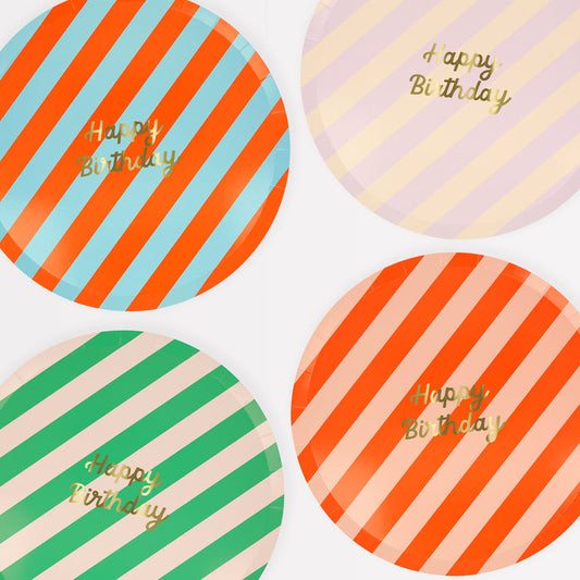 Bold striped birthday plates with gold foil 'Happy Birthday' text, pack of 8, 4 vibrant colors.