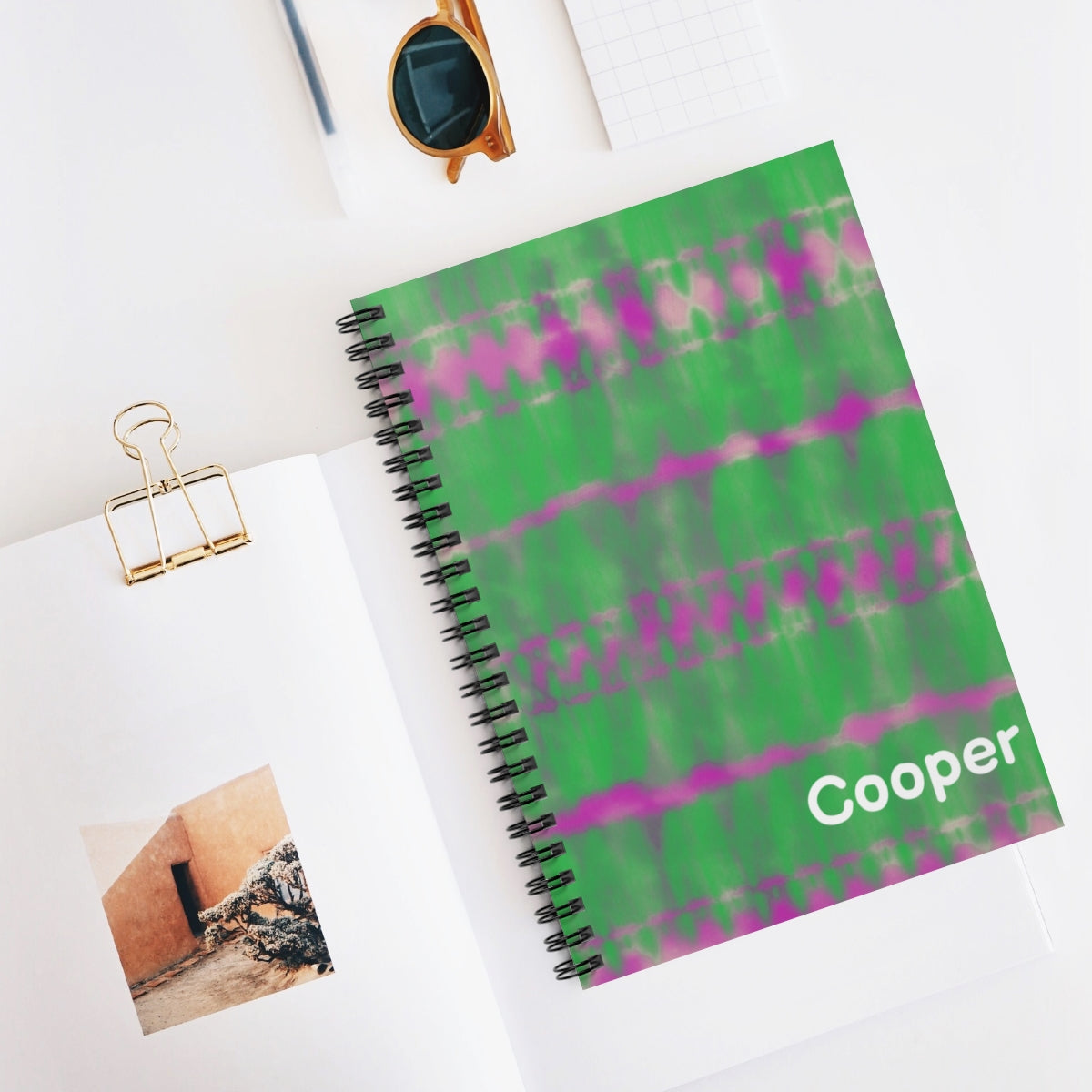 Personalized green tie-dye journal with custom font and color. Features 118 ruled pages, metal spiral binding, and measures 6&quot; x 8&quot; (15.2 x 20.3 cm) Ideal for adding a unique touch to your writing.