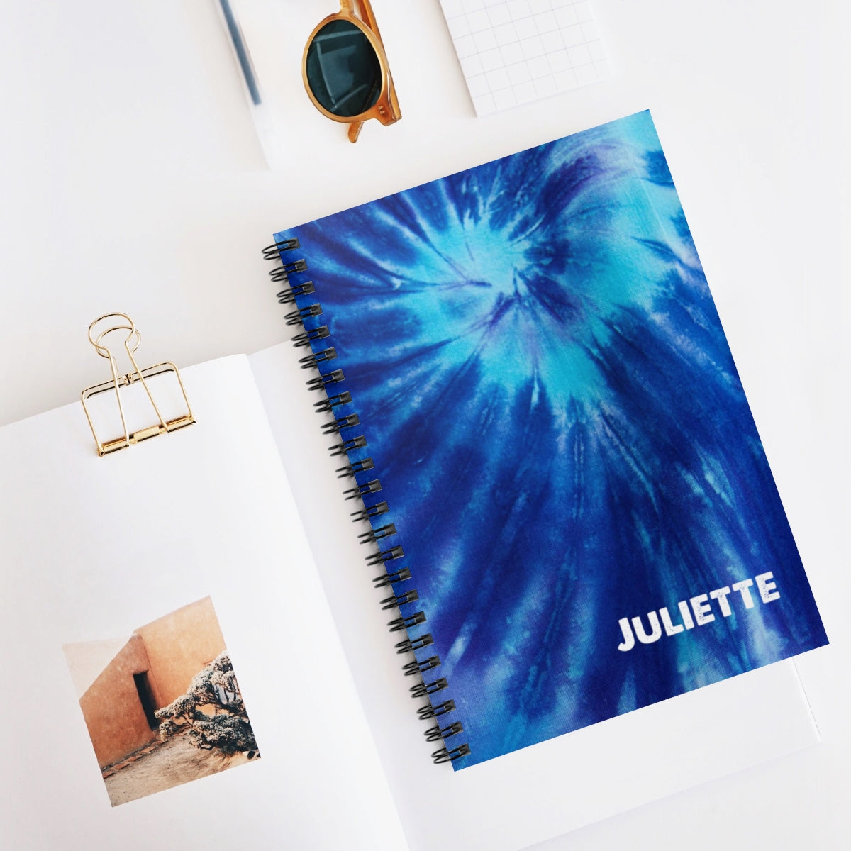 Green tie-dye journal with a retro cover, designed to spread positivity through writing. Features 118 pages of ruled line paper, personalized font and color options, and metal spiral binding. Dimensions: 6" x 8" (15.2 x 20.3 cm)